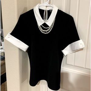 Karl Lagerfeld Paris black and white blouse with removable pearls.
